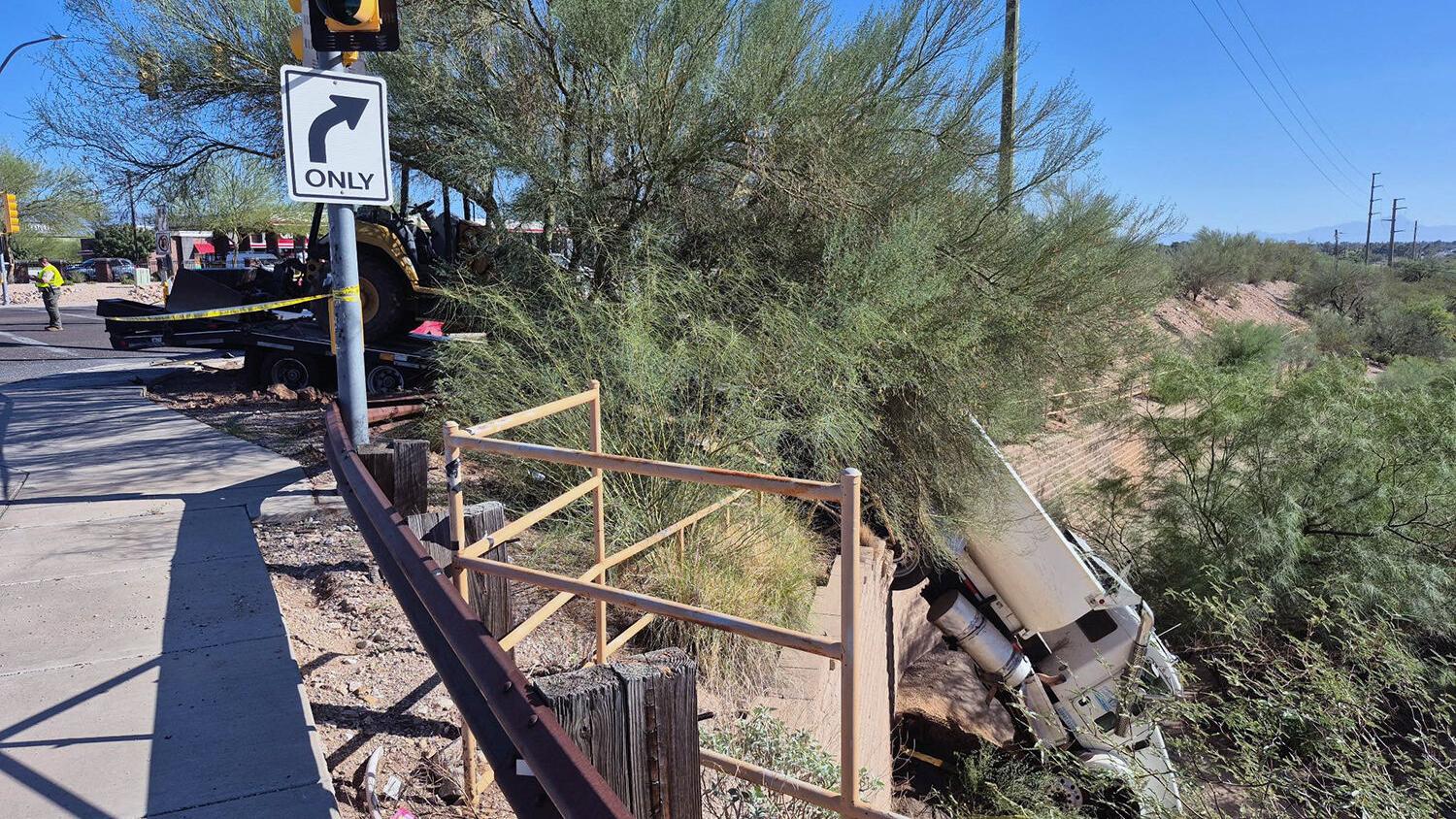 Woman killed in Tucson crash with dump truck